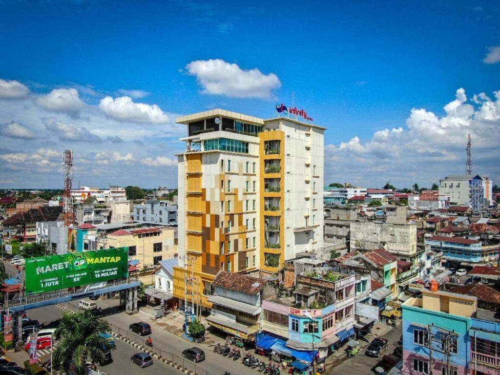 Infinity Hotel Jambi By Tritama Hospitality Bagian luar foto